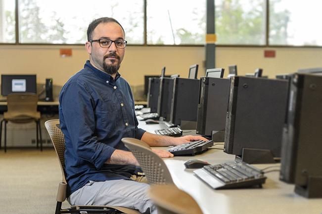 Saad M. in a computer lab